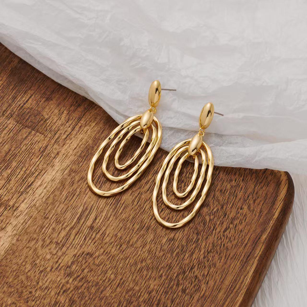 

Gold-Plated Brass Triple Layer Twist Circle Statement Earrings