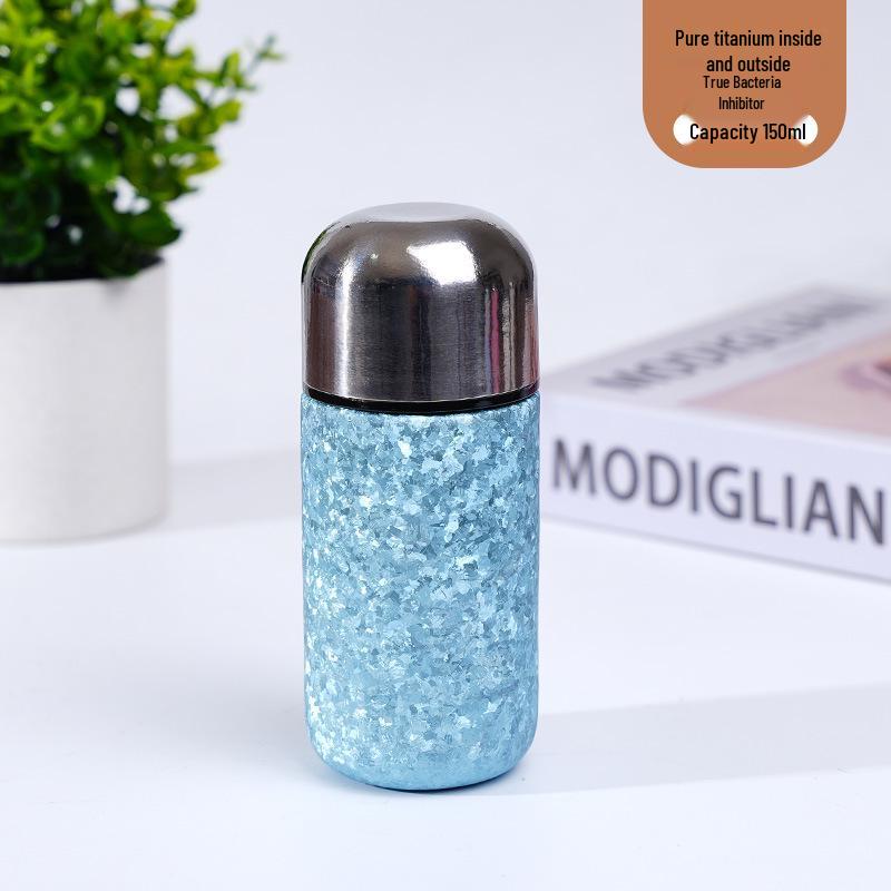 > Sleek Mini Titanium Antibacterial Double-Layer Thermos Cup - Portable, High-Value, Pocket-Sized.