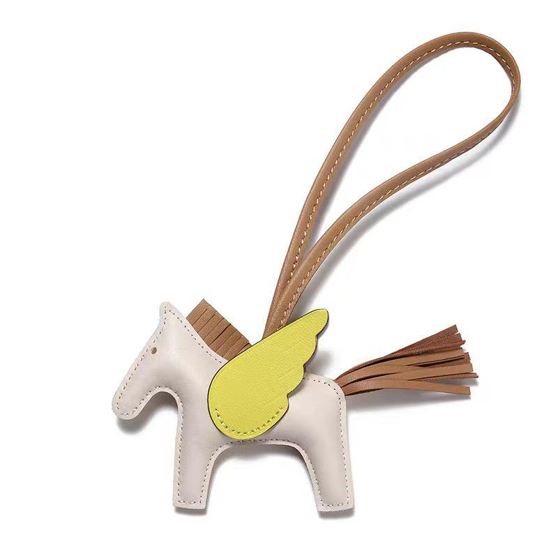 Håndsømmet Ekte Skinn Pony Veskeanheng - Søtt Lammeskinn Flygende Hest Design