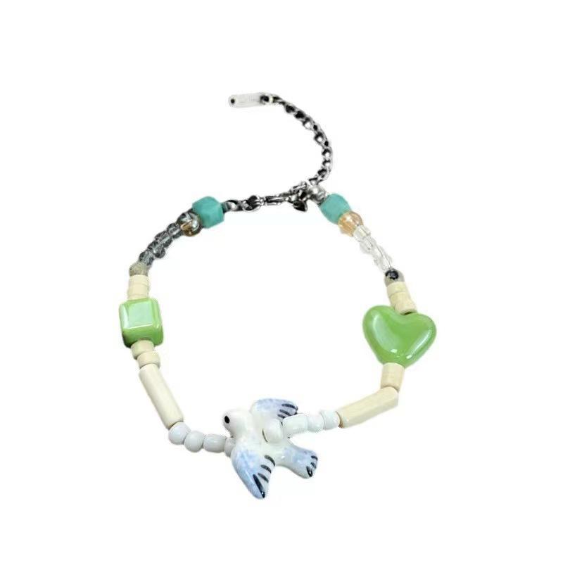 

Love square splicing beaded bracelet couple girlfriend ceramic bead lucky swallow bracelet niche design temperament jewelry