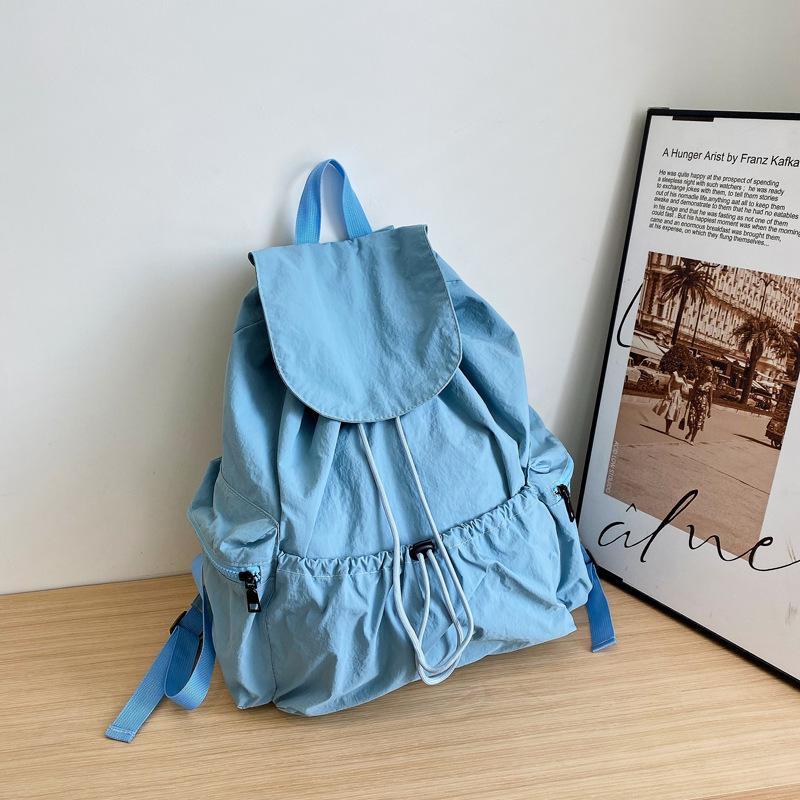 Schoolbag nylon backpack for women, 1011 new large-capacity lightweight student backpack, drawstring outdoor travel small shoulder bag