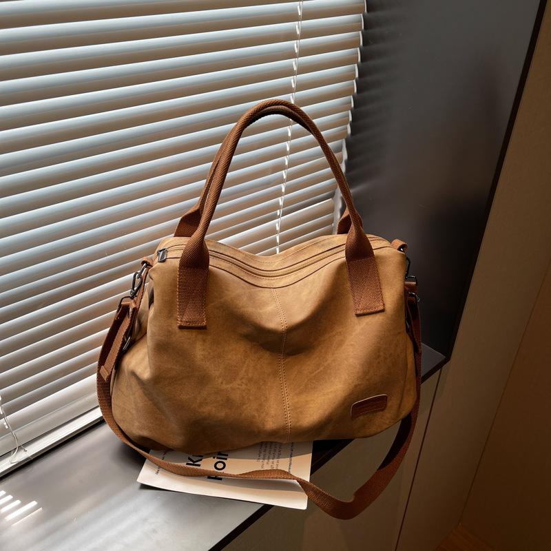Fashion large-capacity travel bag contrasting colors 2025 casual retro canvas versatile messenger bag shoulder bag handbag