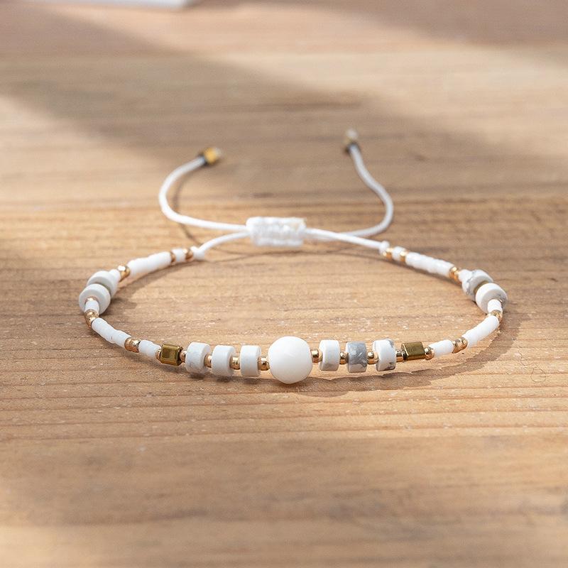 Bohemian colored rice bead bracelet women's ins wind niche faceted stone adjustable hand rope jewelry tide