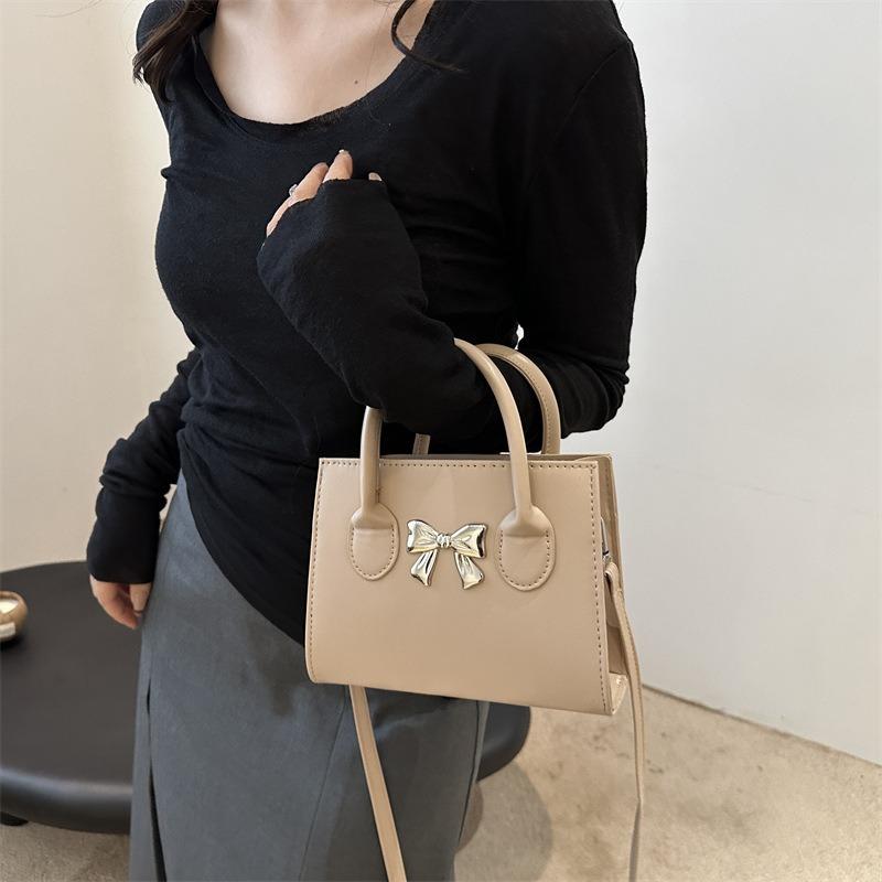 Sac pour femme portable design de niche nouvelle mode sac à bandoulière polyvalent simple sac messager de navette fourre-tout