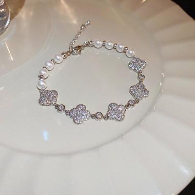 Leichter Luxus und High-End-Feeling, Mikro-Intarsien-Zirkon-Armband, vierblättriges Kleeblatt, Blumenperle, Silberarmband, exquisites Temperament-Armband