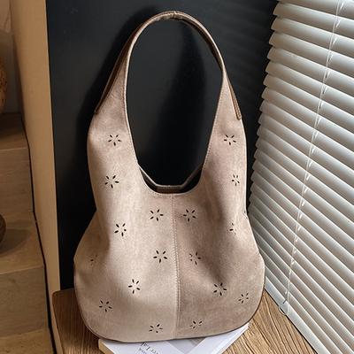 2025 Autumn New High-value Bucket Bag Female Personality Hollow Engraving Design Lazy Wind Shoulder Armpit Bag