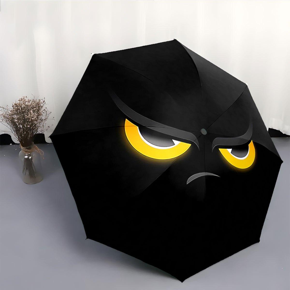 

A Folding Umbrella Featuring an Angry Cartoon Face with Bright Yellow Highlights. Its Compact Design Makes It a Convenient Out Iron&8K
