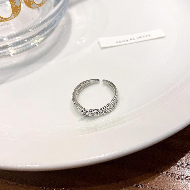 Silver knotted ring women s niche personality micro-inlaid zircon ring ring 2025 new jewelry opening adjustable