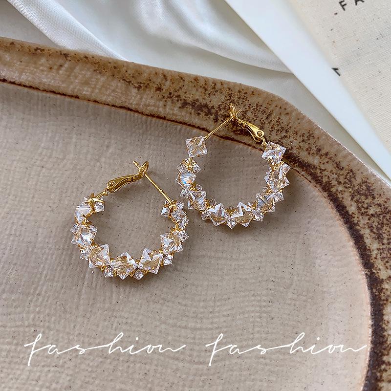 Explosive A-grade zircon crystal earrings, earrings, women s niche temperament, light luxury, designer stud earrings, exquisite jewelry.
