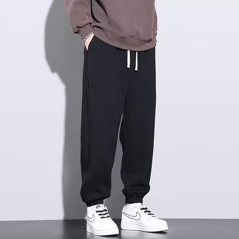 

Мужские спортивные штаны большого размера свободного кроя с манжетами - Весенне-осенняя повседневная спортивная одежда Extra Large чёрный