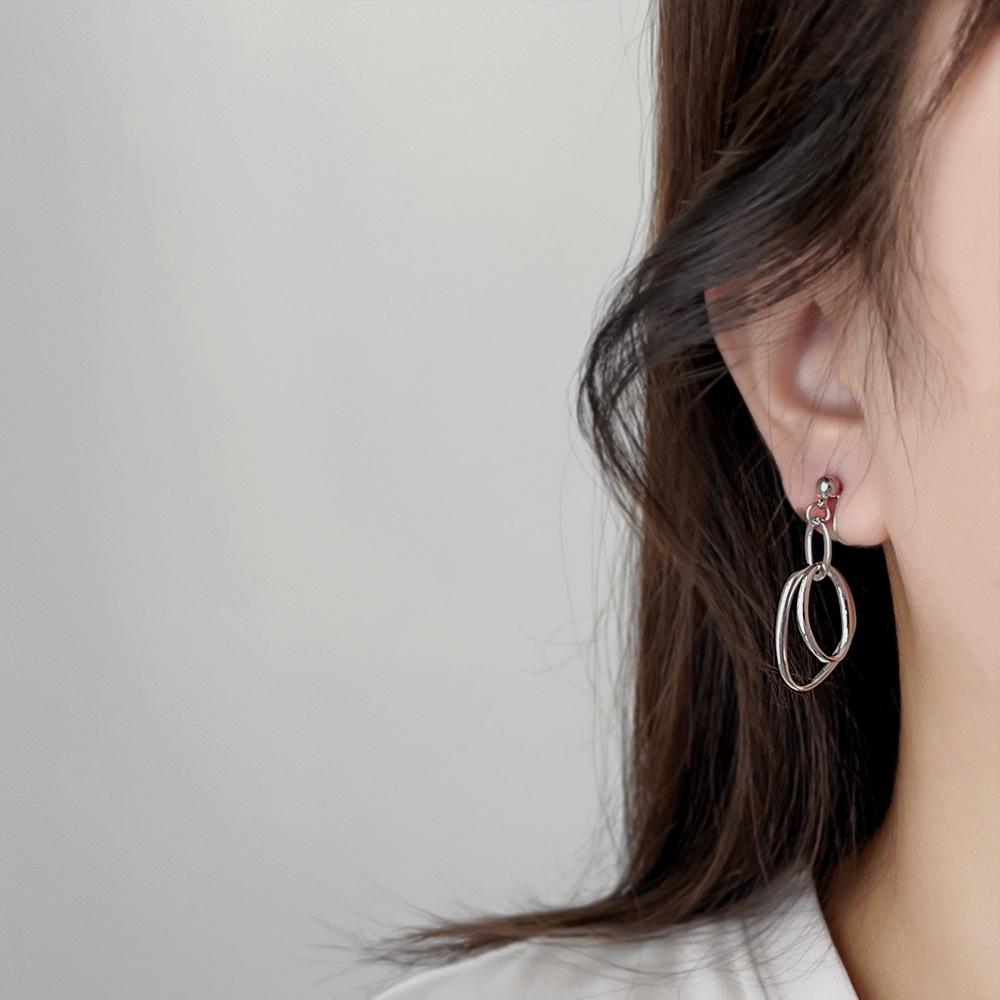 Niche Metal Circle Clip-On Earrings for Unpierced Ears - Fashionable, Mosquito Coil Design