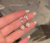 Koreanische Dongdaemun Geometrische Hängeohrringe mit Perlen - Trendige Accessoires für Frauen.