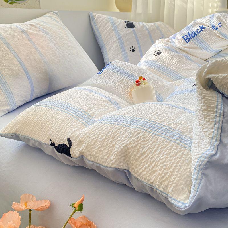Nordická jednoduchá pruhovaná malá černá kočka praná bavlna čtyřdílná sada kreslený povlak na přikrývku prostěradlo studentská kolej třídílná sada