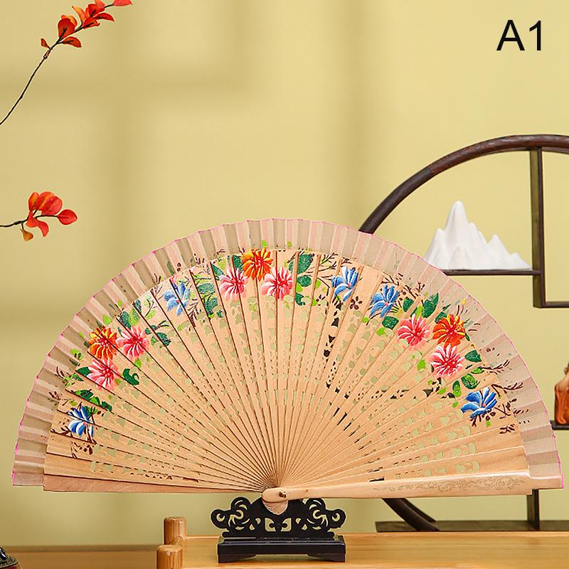 

Chinese Style Double-Sided Folding Fan Hollow Double-sided Craft Gift Dancing Printing Wood Spanish Hand Fan Party Supplies