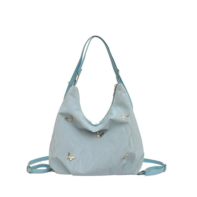 

Жіноча сумка великої ємності літній 2024 новий модний дизайн для приміських поїздок багатофункціональний двосторонній рюкзак через плече з одним плечем синій