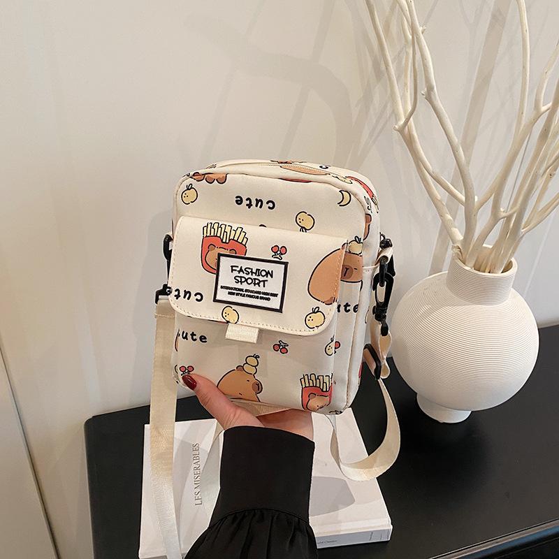 

Маленькая квадратная сумка женская 2025 весна и лето новая маленькая свежая повседневная универсальная кроссбоди на плечо женская сумка студенческая маленькая сумка-портфель one size fits all