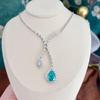 Shine Wing 2023 European-American S925 Silver High Carbon Diamond Mermaid Love Necklace with Paraiba Tourmaline Green.