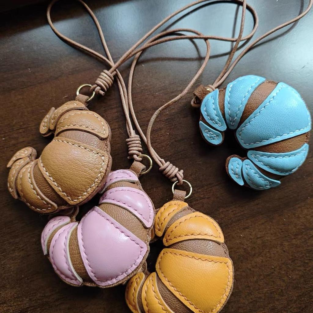 Handmade Leather Croissant Shaped Bag Charm Keychain Accessory for Fashion Enthusiasts Unique Backpack Accessories