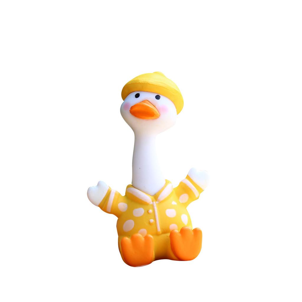 Pvc Whimsical Duck Toy With Eyes Tilted For Kids And Collectors