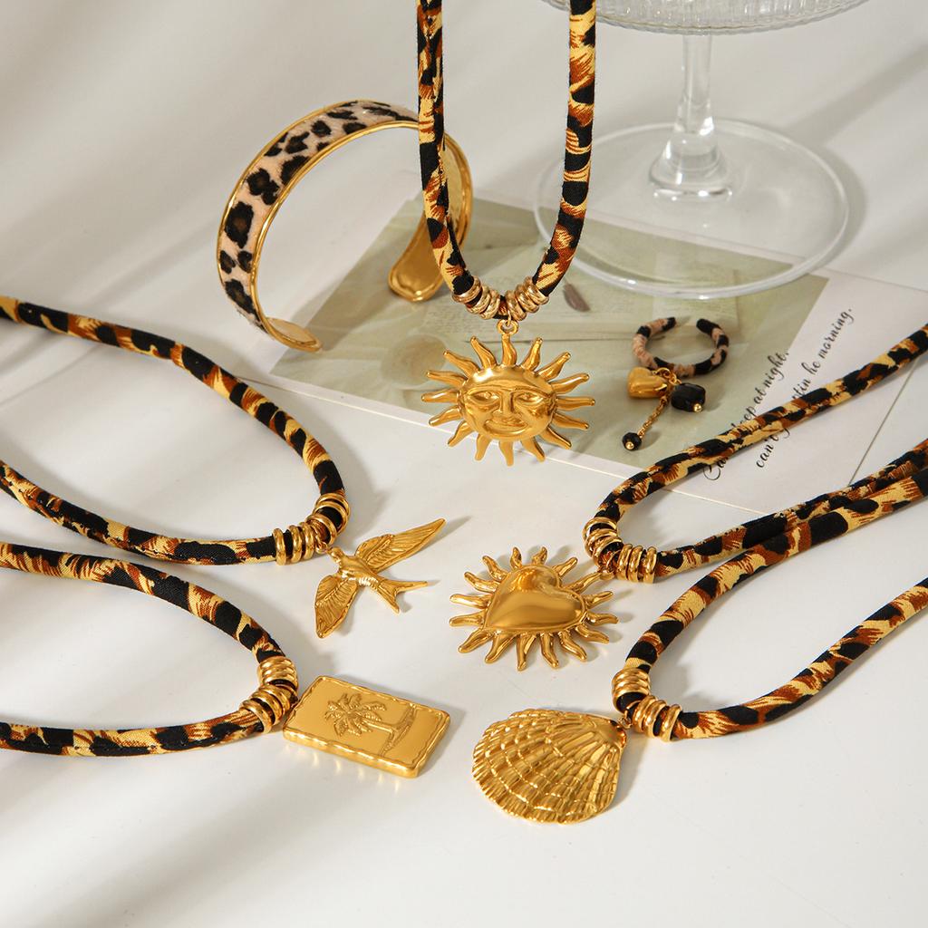 Retro leopard print woven rope necklace, niche high-end bracelet, fashionable versatile titanium steel earrings