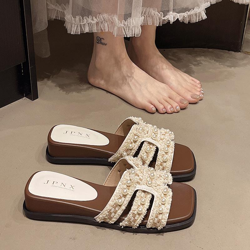 Pearl French holiday cool slippers women's summer wear 2025 new flat-bottomed non-slip with skirt gentle one-word slippers