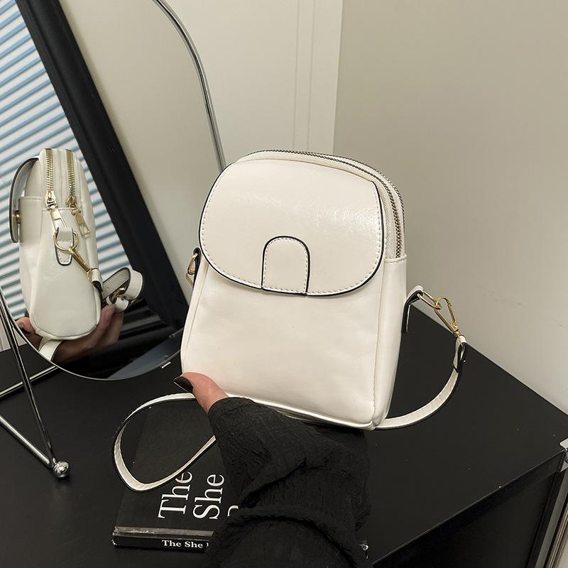 

Mobile phone bag female messenger 2025 new fashion versatile mini small bag high sense lightweight shoulder bag change bag білий