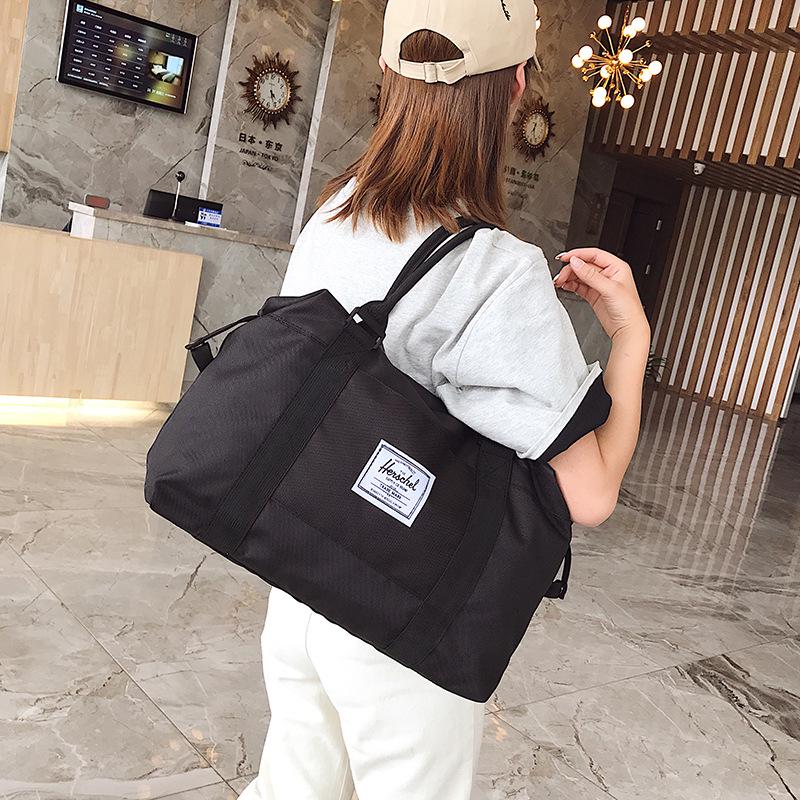 

Женская дорожная сумка из ткани Оксфорд: Легкая сумка большой вместимости для ручек тележки, идеально подходит для коротких поездок или в качестве корпоративного подарка. чёрный