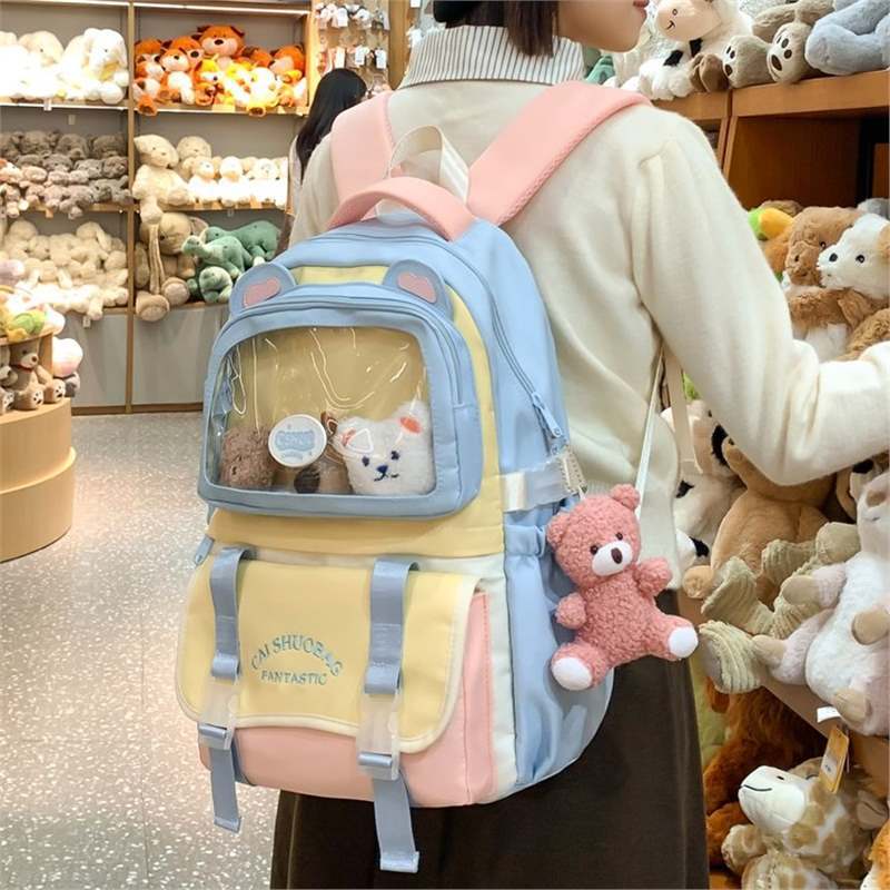 Schoolbag1011 autumn new high-value color matching design transparent pain bag cute cartoon student large-capacity backpack