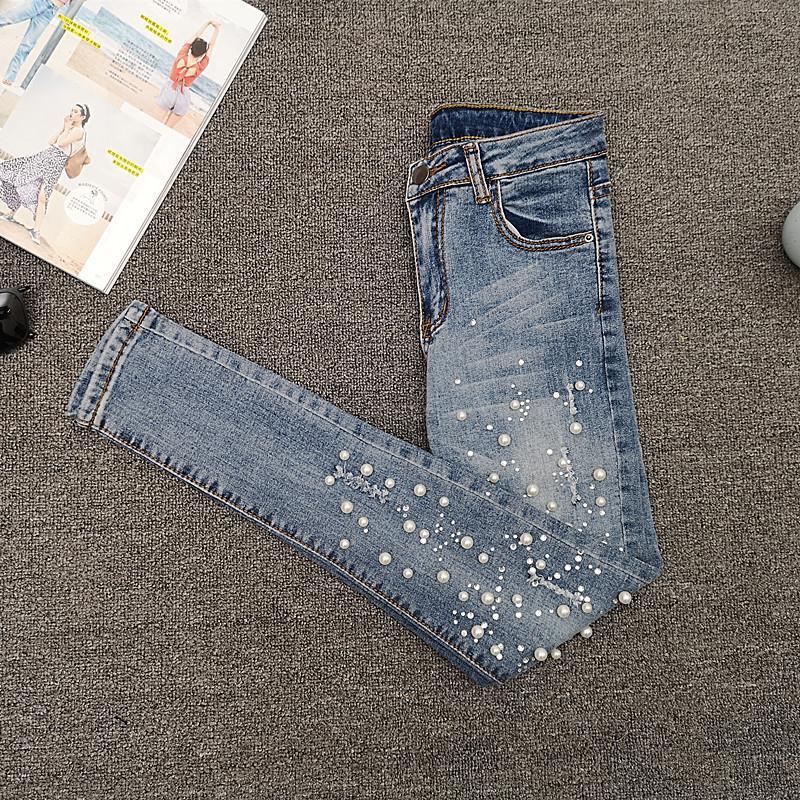 Jeans Skinny Denim Dimagranti Strappati con Perline Europee per Donna - Collezione Estate 2026