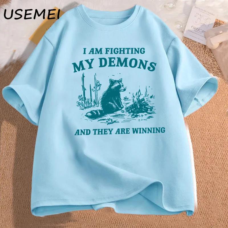I Am Fighting My Demons Raccoon Meme T Shirts Funny Graphic Printed T-shirt Men Women Fashion Harajuku Retro T-shirt Cotton Top