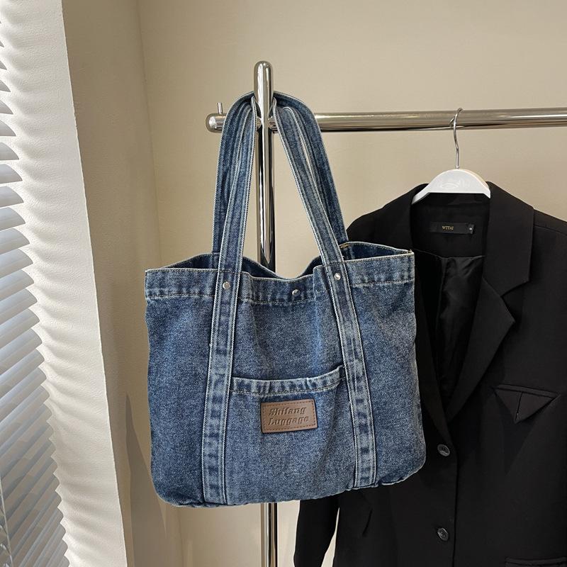 

Casual canvas shoulder bag women s 2025 new large-capacity shopping bag niche literary tote bag casual handbag