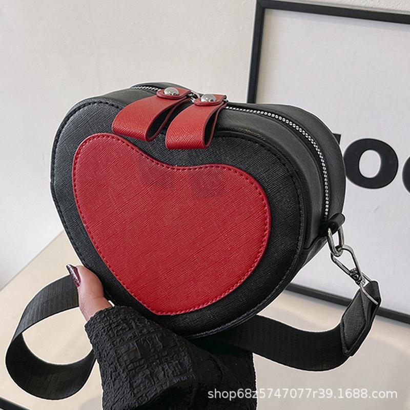 Women's bag 2025 new trendy fashion messenger bag simple foreign fashion popular women's bag shoulder bag cute peach heart small bag
