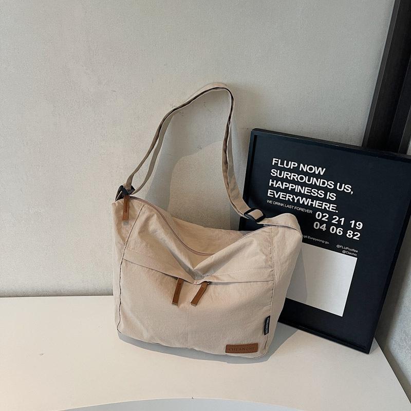 Canvas bag women's large-capacity new versatile shoulder messenger bag cloth bag class commuter tote bag