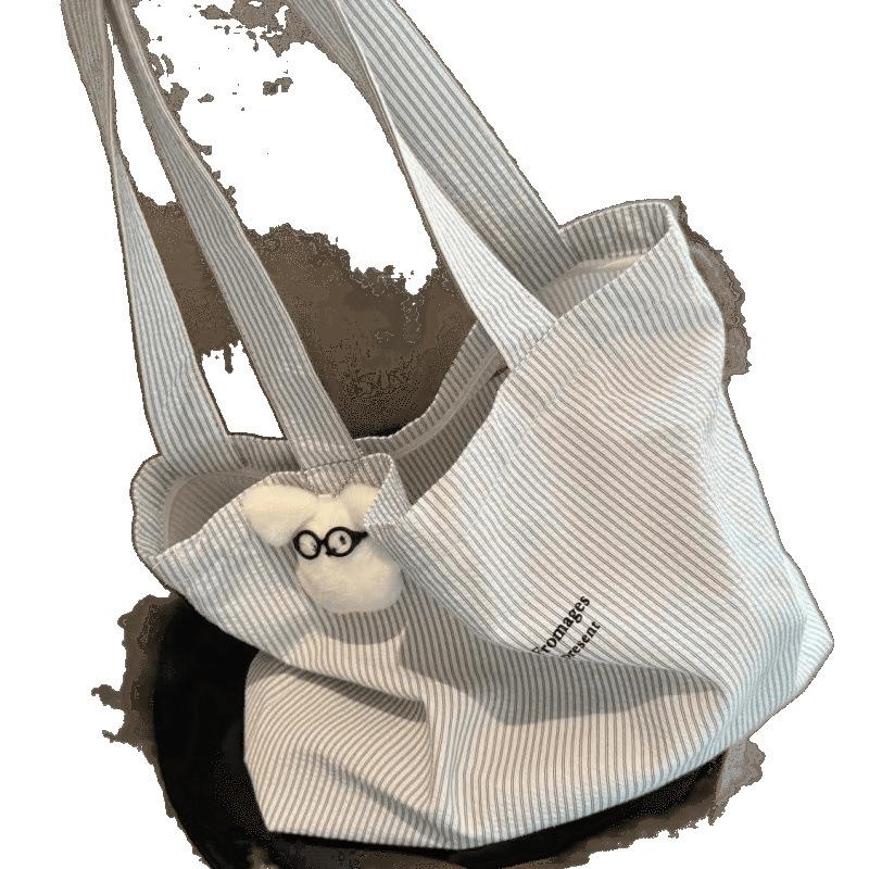 The new casual stripe is lazy and simple, and the large-capacity 2025 canvas bag is versatile and can be worn on one shoulder tote