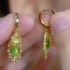 2025 Hot Seller: Chinese Green Cat's Eye Leaf Earrings - Women's Light Luxury
