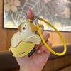 Creative Cartoon Mango Pudding Dog Leather Keychain - Cute Fruit Pendant for Girls' Bags.