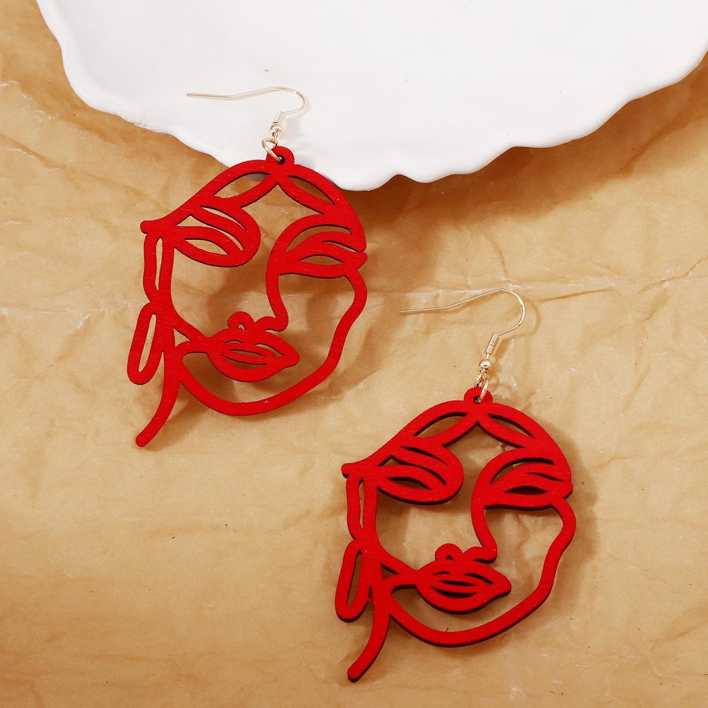 Niche design sense, personalized earrings, fashionable and trendy laser-cut wooden abstract face ear hooks