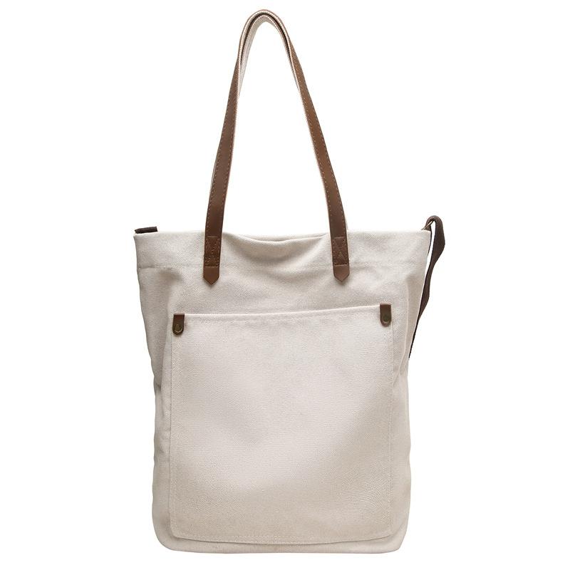 Canvas bag women's shoulder oblique span bag large capacity lazy wind shopping bag simple and versatile