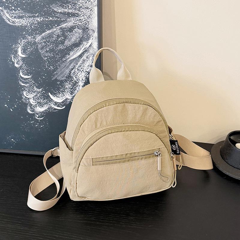 

2025 summer new backpack large capacity multi-pocket practical backpack lightweight simple leisure travel commuter bag хаки