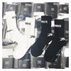 Trendige Vete Classic Co-Branding-Socken mit schwarz-weißem Schriftzug im europäischen und amerikanischen Street-Sport-Stil, mittellange Socken aus reiner Baumwolle