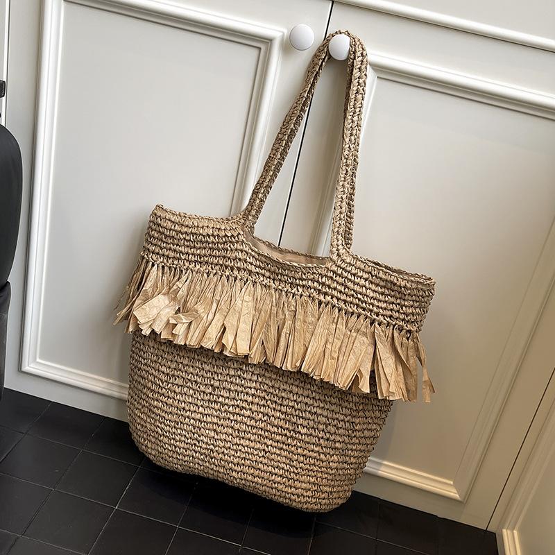 

New Bohemian summer straw bag woven tassel large capacity tote women s shoulder bag