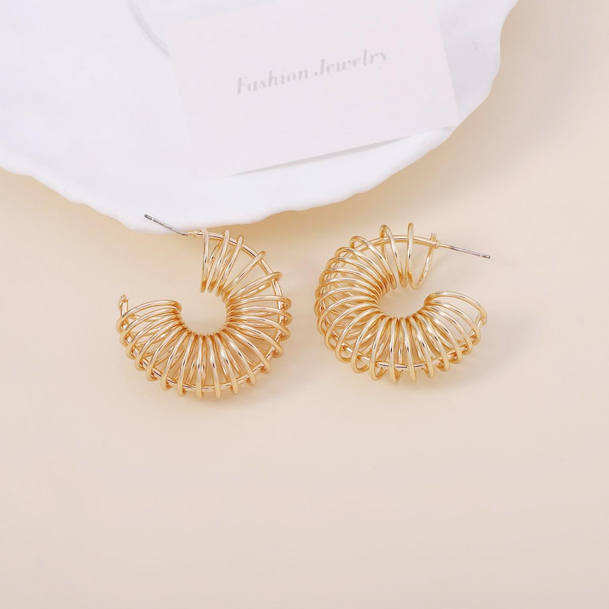 

Холодный и отстраненный стиль полый кольцевой пружинный серьги-пусеты двойная спираль