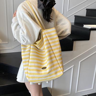 Koreanische Version lässiger fauler Stil große Kapazität Achseltasche Damen 2025 neu doppelseitige Rückseite Segeltuchbeutel gestreifte Beuteltasche