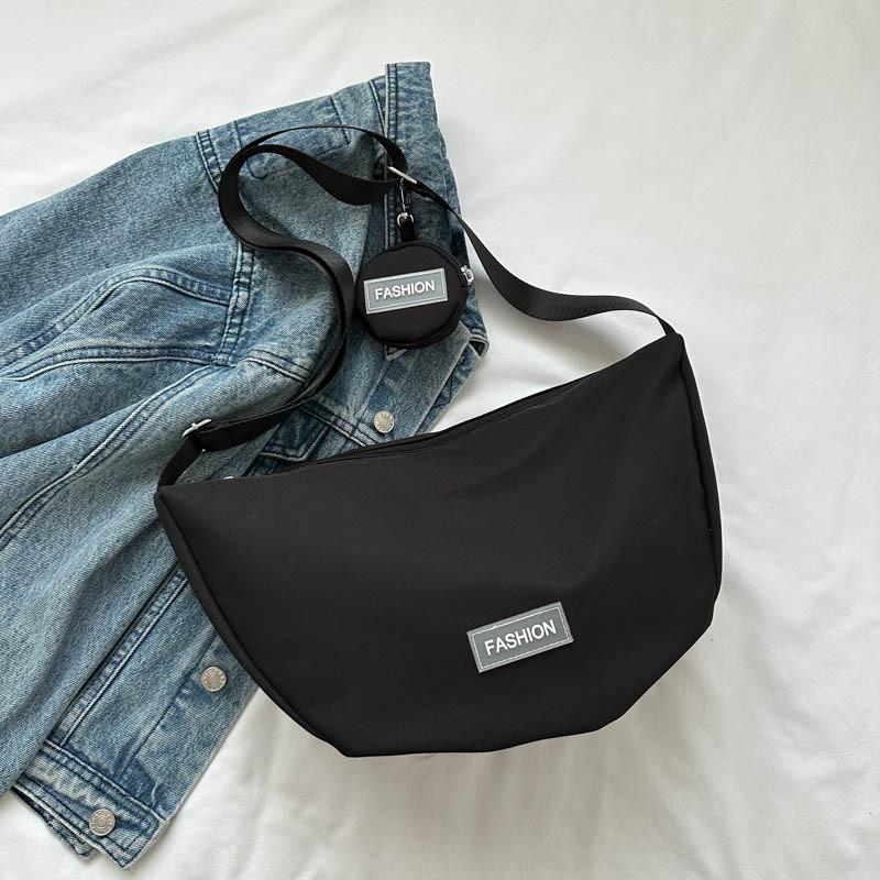 Fashionable And Minimalistic Dumpling Bag For Women Spacious Shoulder Bag Available In Black White Green Red Orange And Pink