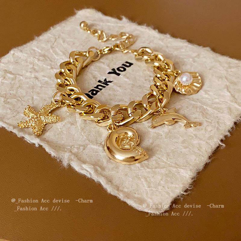 Elegant Dolphin Starfish Seashell Pearl Bracelet: High-end Minimalist Bangle for Women