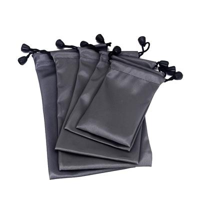 Wasserdichter grauer Kordelzugbeutel für Powerbank, Telefon, Festplatte und Selfie-Stick.