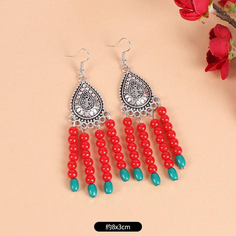 

A few red fringed forehead chains, exotic forehead, eyebrow pendant, retro earrings, women s Tibetan headdress.