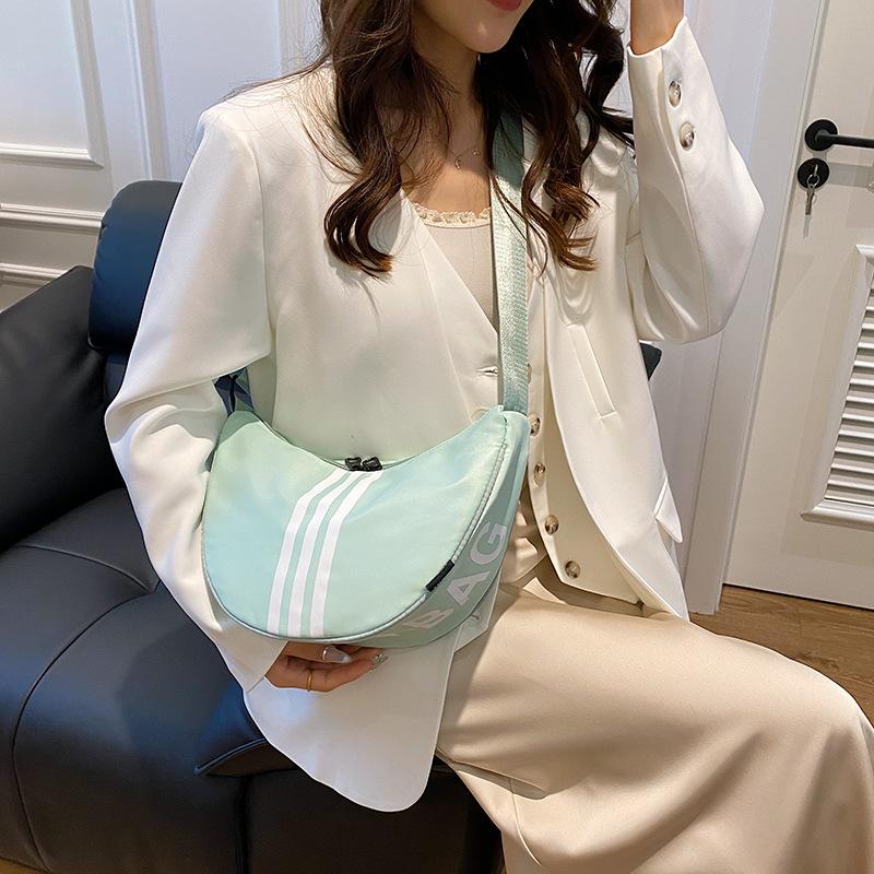 Summer waterproof nylon cloth bag women's 2025 new casual messenger dumpling bag versatile ins popular shoulder bag