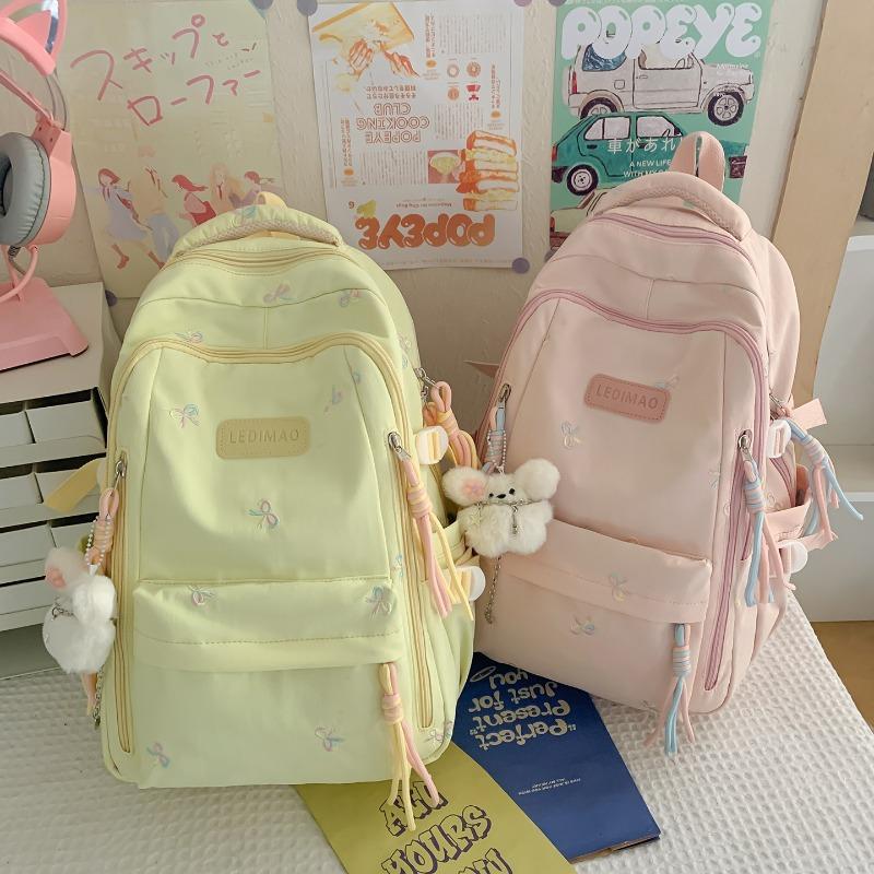 New schoolbag female junior high school college student small fresh bow large capacity backpack dopamine backpack