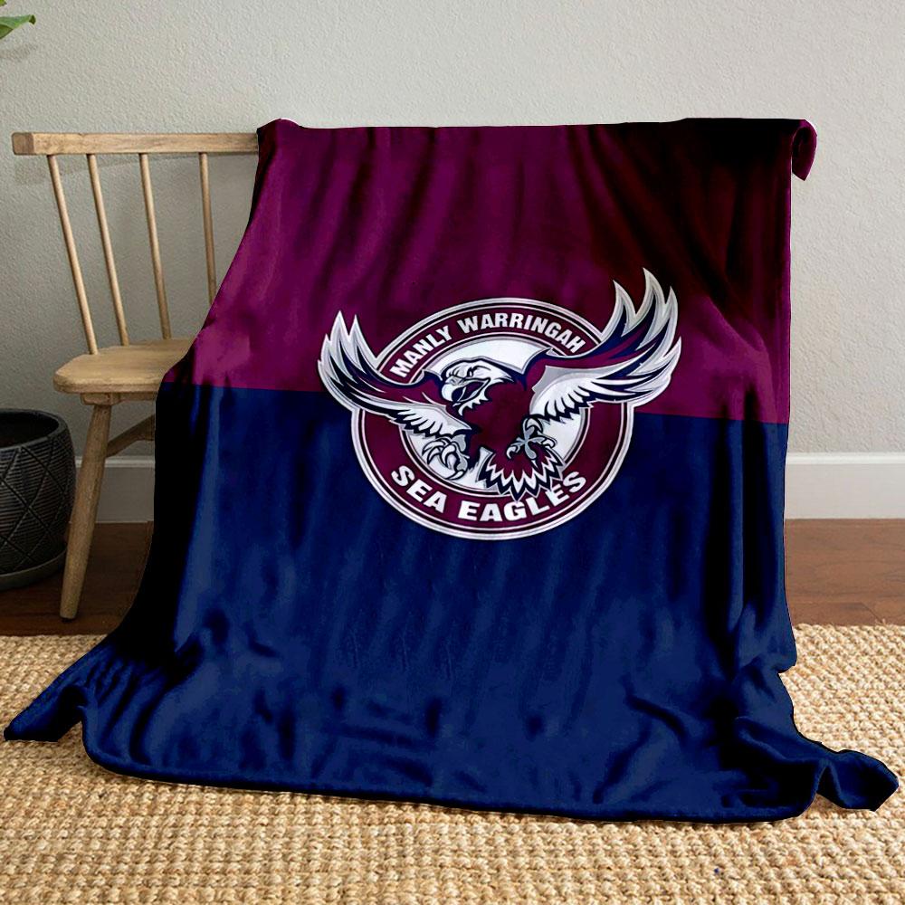 A bold eagle logo with text, split background in maroon and navy. for all seasons blanket lunch break throw gift